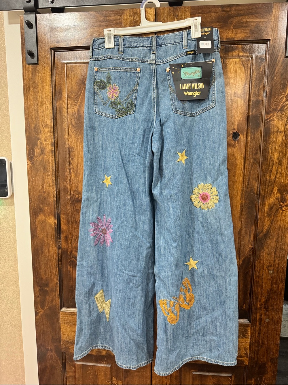 Wrangler x Lainey Wilson Embroidered Light Blue Flared Jeans with Patches - Picture 2 of 7